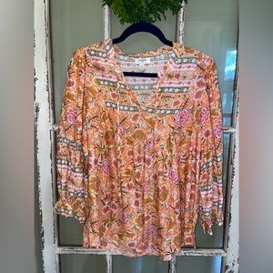 Umgee brand top with tie and flutter wrist. Beautiful print. Worn once.